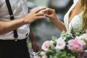 Couple exchanging vows during a Rainbow Wedding Chapel ceremony